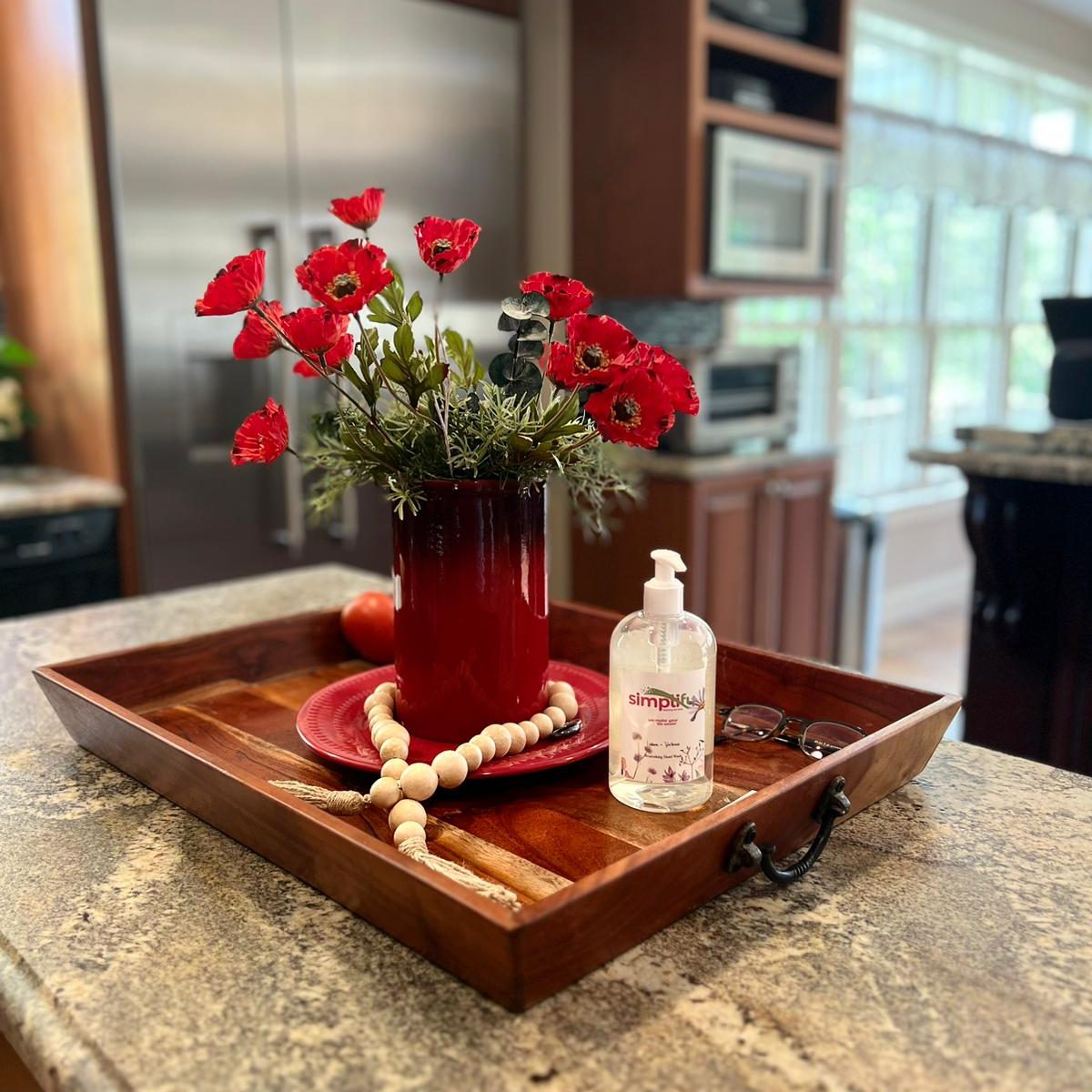 Close-up of a professional cleaner scrubbing the interior of a microwave to remove grease and food residue for a sanitized kitchen.